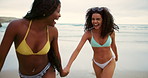 Laughing, women and friends running at beach for wellness, bonding or travel on holiday in Bali. Outdoor, funny joke or happy girls at sea playing for freedom in summer bikini on vacation together