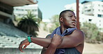 Stretching, arms and runner with black man in stadium for sports athlete, competition practice and track event. Wellness, warm up and running with person in field arena for fitness and training 