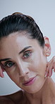 Dermatology, beauty and face of woman in studio for anti aging, cosmetics and wrinkle treatment. Skincare, touch and portrait of person for beauty, wellness and shine of natural texture on background
