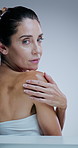 Skincare, body and face of mature woman in studio for beauty, cosmetics and facial on white background. Dermatology, salon and portrait of person for natural skin, anti aging treatment and wellness