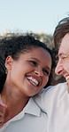 Travel, love and couple with laughing in nature for honeymoon vacation, outdoor breeze or romantic date. Interracial people, happy and holiday weekend for anniversary, funny conversation and bonding