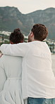 Walking, hug or back of couple at beach for valentines day, love or romance in interracial relationship. Sea, vacation or people bonding on holiday for romantic honeymoon, embrace and travel date