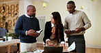 Business people, laptop and conversation with planning, documents and cooperation for project. Group, coworking and employees in modern office, talking and ideas for proposal and company development