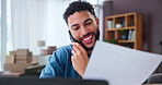 Box, phone call and small business with man in living room of home for communication or freelance delivery. Documents, logistics and order with supply chain entrepreneur in apartment for remote work