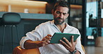 Home, confused and man with tablet, lounge and doubt for payment to streaming site and thinking. Living room, browsing and cancellation of subscription to app, frown and person with tech in house