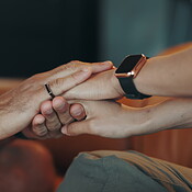 Home, couple and holding hands for love, support and forgive with ...