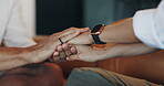 Home, couple and holding hands for love, support and forgive with empathy for relationship together. Man, woman and comfort closeup for kindness, sorry and connection with compassion in living room