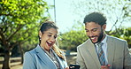 Happy, business people or laughing with phone for good news, success or teamwork at outdoor park. Businessman, woman or colleagues with smile for friendly chat, humor or app on mobile smartphone