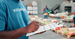 Social responsibility, hands and person with clipboard, volunteer and organised for nonprofit in community center. Charity, writing and inventory for gifts in ngo, donation and inspection with info