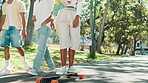 Skateboard, students and relax with woman in park for college vacation, spring break and urban fashion. Balance, happy and energy with person in nature for skating, gen z youth and streetwear style