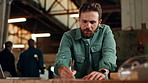 Carpentry, woodwork and man on laptop and writing for client orders, furniture and manufacturing. Factory, construction and person on computer for lumber, timber inventory and production in workshop