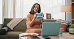 Baby clothes, laptop and video call with woman on sofa in living room of home for communication. Beanie, computer and smile with happy pregnant mother in apartment to show newborn clothing purchase