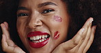 Black woman, lipstick print and face in studio with smile, pride or excited for emoji, love and afro. African girl, model and happy in portrait with sign, makeup and creativity for beauty in Kenya