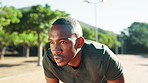 Breathe, break and black man with fitness in nature for sports, exercise and training for marathon. African athlete, tired and exhausted from workout with sweat, run fatigue and cardio in park