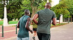 Back, men and running workout at park for endurance training, morning routine or marathon performance. Fitness, people and runner club with cardio pace, exercise teamwork or outdoor race for wellness