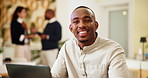 Black man, face and happy with laptop in office, news and proofreading for creative agency. Portrait, male person and journalist with digital for business story, editing and website for publication