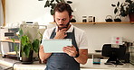 Thinking, man and waiter on tablet at cafe of planning, online order and booking for menu update. Male person, ideas and digital of inventory management, review customer service and sales performance