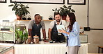 Woman, waiters and talk with tablet at cafe for explaining, menu update and feedback of training. Business owner, staff and discussion with digital for stock advice, coaching and inventory management
