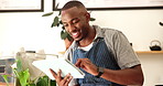 Online order, smile and tablet with black man in cafe for booking or management of small business. Ecommerce, internet and planning with barista reading stock checklist in coffee shop or restaurant
