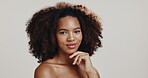 Face, black woman and skincare for smile, dermatology and healthy skin on white studio background. Portrait, African model and person with cosmetics, satisfaction and spa treatment for natural beauty