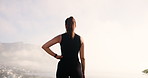 Running, fitness and back of woman on mountain with view for wellness, health and thinking. Sports, athlete and person on mountain to rest after training, marathon exercise and workout in morning