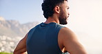 Running, fitness and man on mountain with view for wellness, health and relax in nature. Sports, athlete and person on mountain to rest after training, marathon exercise and workout in morning
