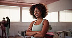 Proud, face or woman with arms crossed in pilates class for exercise, posture training or body. Portrait, happy instructor or girl in yoga session for fitness support, health or wellness in studio