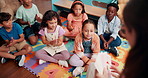 Teacher, students and education answer in class of applause, learning success or lesson celebration. Children, clapping hands and quiz achievement, feedback and kindergarten assessment of development