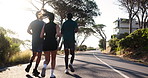 Fitness, road and friends running in morning for workout, exercise and marathon training together. Sports, runner team and men and women for wellness, health and performance for challenge outdoors