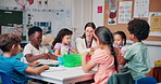 Studying, students and education with teacher in classroom for future, lesson and youth. Learning, academy and knowledge with group of kids at school for child development, helping and growth