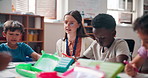 Teacher, woman and children with books, group and learning together with diversity in classroom. Kids, education and development with scholarship, lesson and assessment with guide at academy