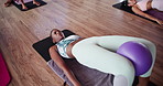 Medicine ball, pilates class and people for gym, legs exercise and activity for club. Weight equipment, group yoga and women for muscle training, fitness and workout for body goals and flexibility