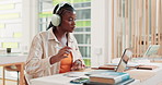 College, black woman and headphones with laptop for education, writing notes and listening to audio. Library, female person and student with digital for business study, test information and music