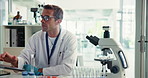 Science, scientist and man with laptop, lab and medical research for test results or data collection. Healthcare, person and investigation for cure of HIV infection, online and tech for treatment
