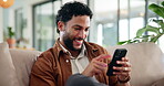 Happy, man and relax with phone at house for browsing social media, communication and reading blog. Smile, male person and mobile with chatting, message to contact and typing feedback of notification