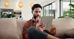 Relax, tablet and thinking with man on sofa in home living room for app browsing or social media. Idea, planning and vision with happy person in apartment for break, connectivity or internet search