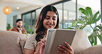 Relax, happy and tablet with woman on sofa for social media post, reading and online update. Networking, newsletter subscription and connection with person in living room at home for chat and scroll