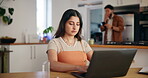 Woman, typing and laptop with remote work at house for research, schedule update and editing blog. Female person, online and email with feedback, writing article and information for publishing agency