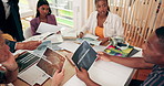 Business people, meeting and documents with creative planning for project, AI development or automation at office. Group, employees or designers with paperwork, UX ideas or UI design at workplace