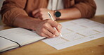 Hand, writing and calendar for schedule, planning and organization with timeline for tasks or event. Priority, agenda and goals with person for productivity, time management and reminder for deadline