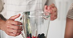 Hands, couple and fruit in blender for smoothie drink, prepare milkshake and nutrition of healthy diet. People, machine and organic ingredients for protein juice, weight loss and gut health at house