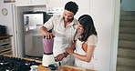 Fruit, smoothie and couple in kitchen with blender for healthy eating, nutrition and berry drink. Home, morning and happy man and woman with breakfast shake for wellness, organic diet and vitamins