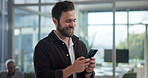 Creative, smile and man with smartphone, browsing and market research for business, online and typing. Office, brand manager and competition analysis on social media, planning and person with mobile
