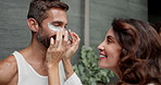 Cosmetics, eye mask and couple with routine, skincare and dermatology with relationship. Grooming, house and man with woman, treatment for dark circles and smooth skin with  beauty and wellness