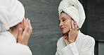 Mirror, morning and woman in bathroom, skincare and wellness with dermatology. Person, house and reflection with routine, treatment and grooming with beauty, shining and glowing with cosmetics