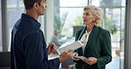 Mentor, talking or business people with tablet in office for budget project, teamwork or capital growth. Investor, feedback or financial advisor with mature executive director or documents in lobby