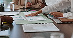Hands, meeting and documents with graphs at office with budget, funding and review with marketing proposal. Group, team and paperwork with stats, charts and feedback for revenue at creative agency