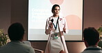 Seminar, audience or businesswoman with mic for talking, training or workshop for employees health. Crowd, presenter or program with speech for conference, presentation or workplace wellness on stage