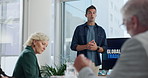 Businessman, screen and meeting with discussion in boardroom for presentation on global trade at office. Male person, speaker or talking to executive team for project ideas, campaign or proposal