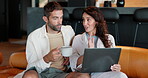 Laptop, coffee and research with couple on sofa for real estate listing, property sales and support. Home loan application, planning and morning with man and woman in house for mortgage registration